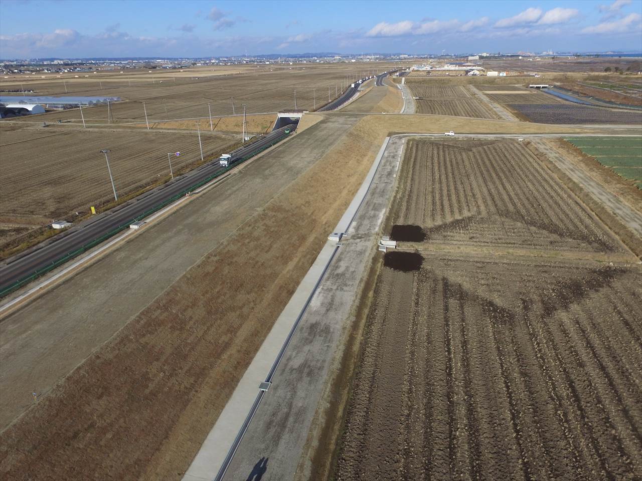 仙台市東部復興道路整備事業（主）塩釜亘理線道路改築工事（井土工区・その３）（橋本店・長谷川建設共同企業体）